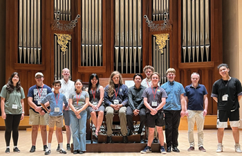 Instructors Eugene Lavery and Jens Korndörfer with the nine camp students and two councilors